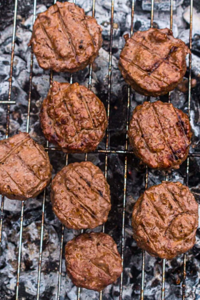 burgers over campfire